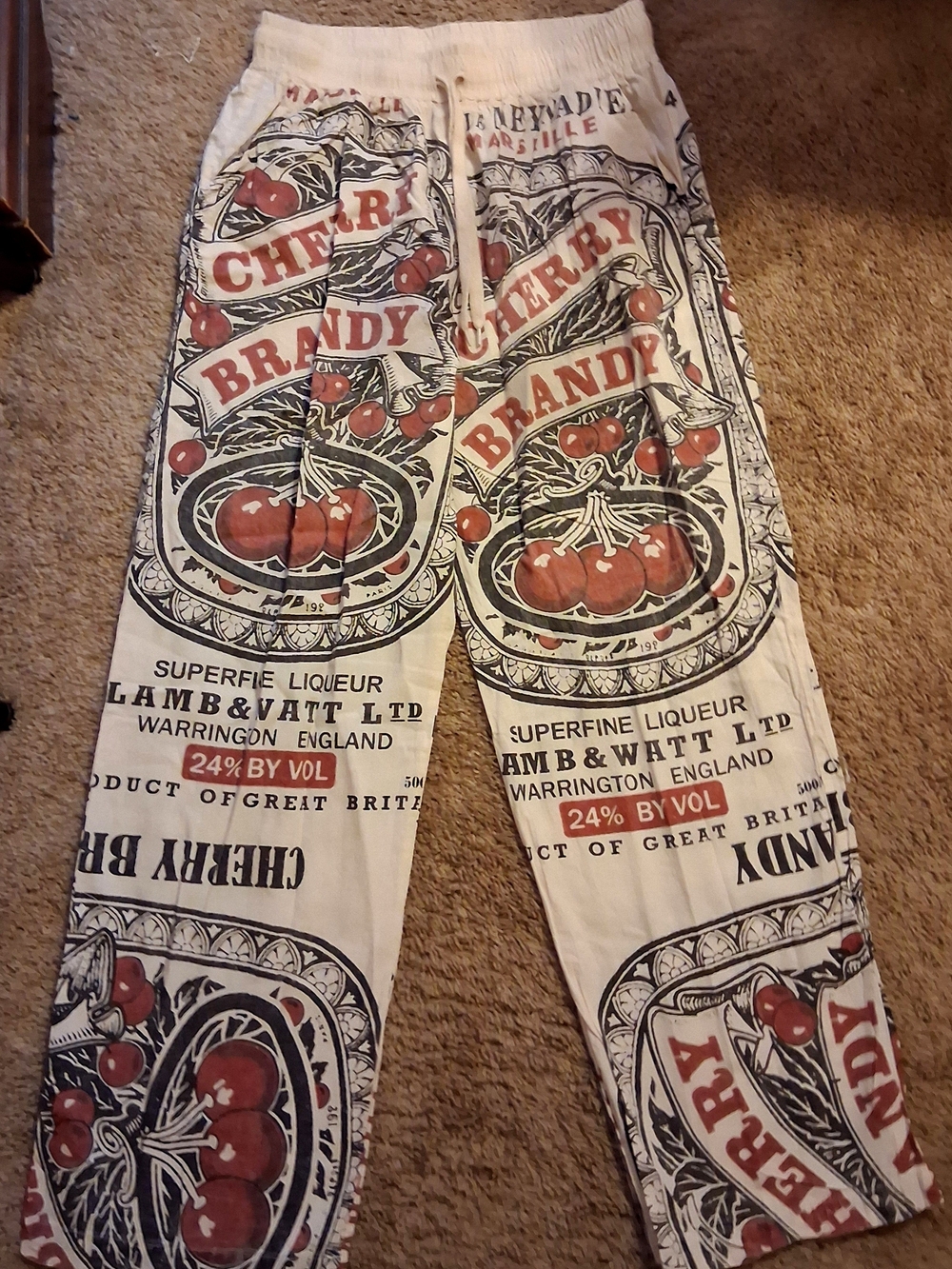 Brandy Melville Cream Graphic Cherry Lounge Pants with Red & Black Print